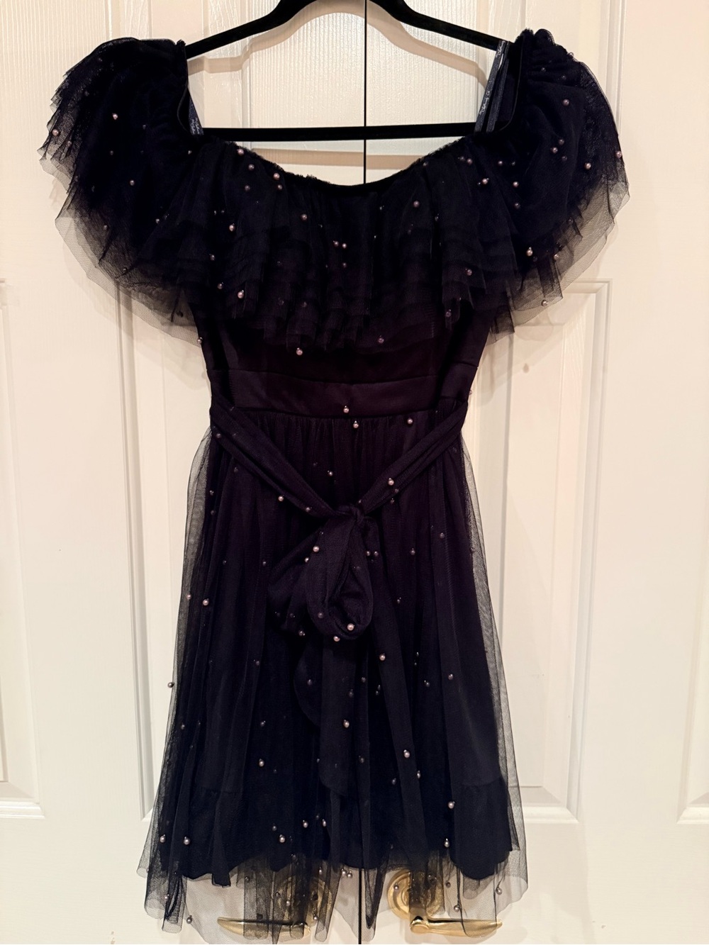 the clothing company Black Tulle Party Dress with Pearl Embellishments